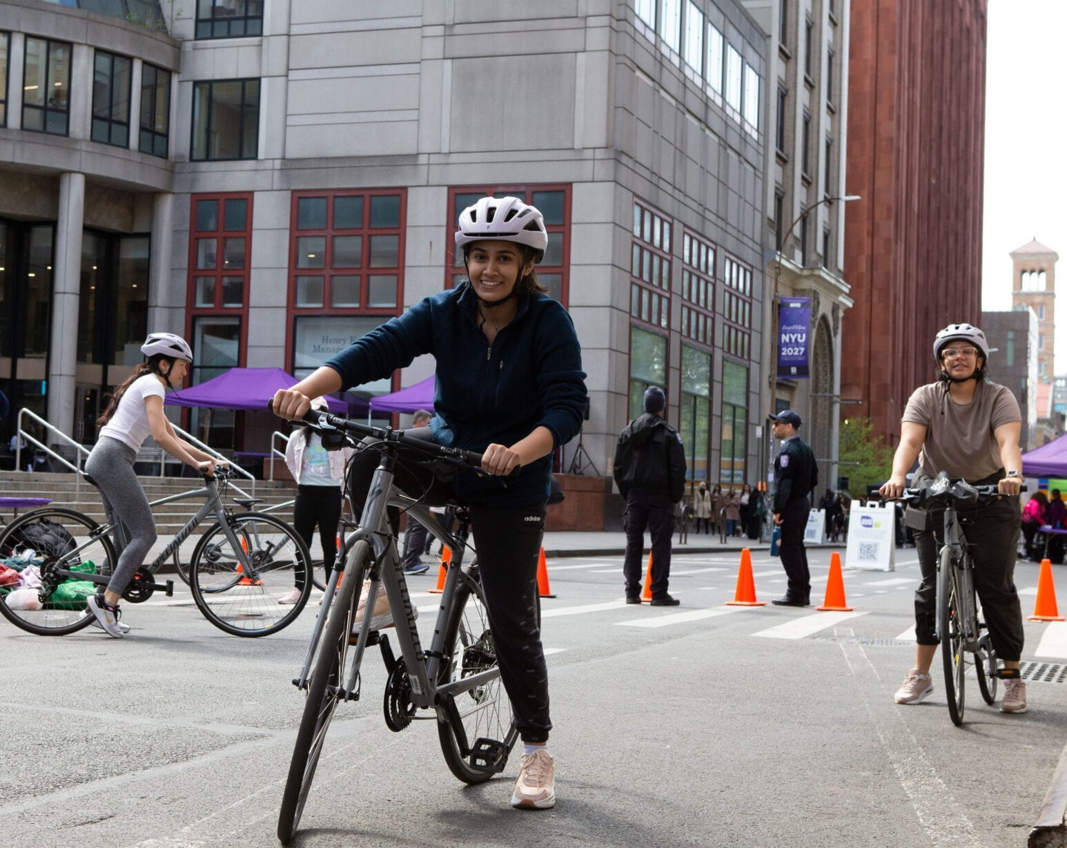 An NYU student learning to ride a bike.