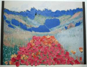 Tactile representation of the oil painting, Poppy Field in a Hollow Near Giverny by Claude Monet made from tape, paper, and fabric flowers. 