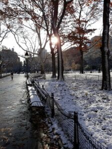 a park bench in the snow