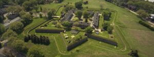 An aerial view of Fort Jay, showing its star-shaped construction