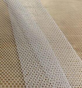 Hard and white polyester crinoline mesh with small holes