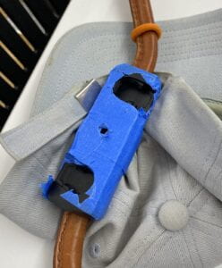 A closeup view of the Fidlock twist socket attached to the harness handle. The "twist" mechanism makes it difficult for the magnet to detach due to random collisions.