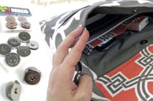 This shows several circular magnetic snaps that can be attached to any bag or piece of fabric 