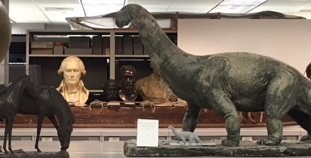 Artifacts atop vertical storage file cabinets