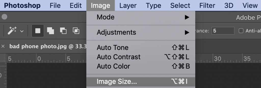 A screenshot of the menu across the top of the screen in Photoshop. After clicking the "Image" option, choose "Image Size" in the dropdown that opens.