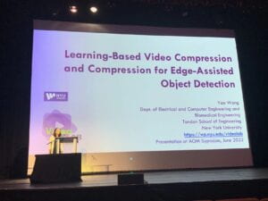 Prof. Wang gave presentation at AOM Symposium