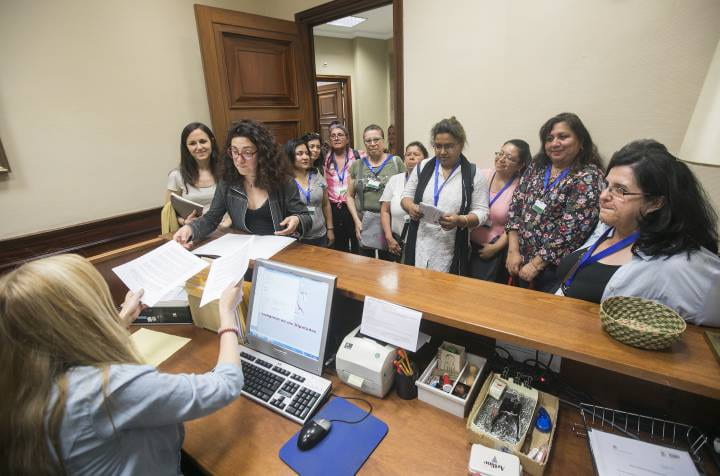 Women in front of secretary