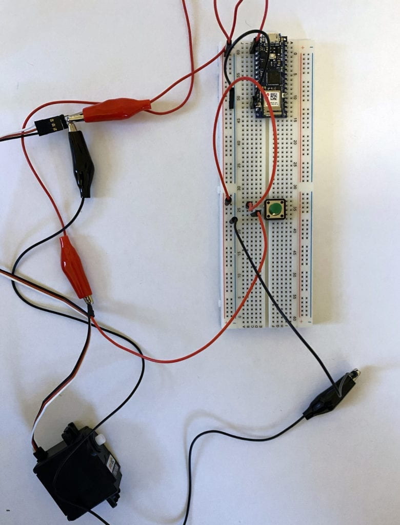 Failed attempt to wire motor into a breadboard with a switch.