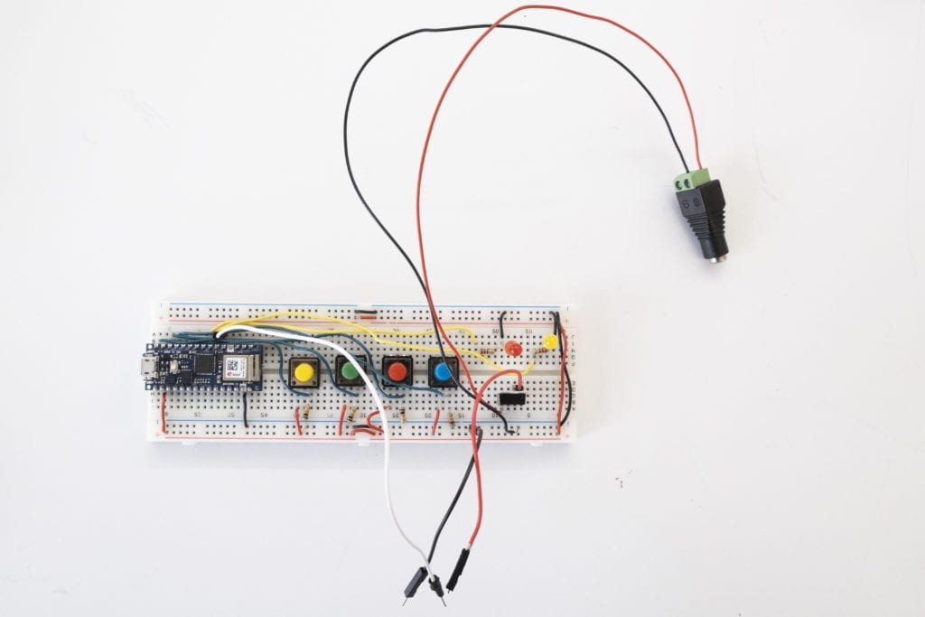 Breadboard with four buttons and socket wired