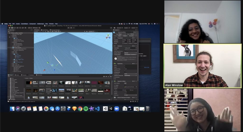 Screen shot of three people working in unity