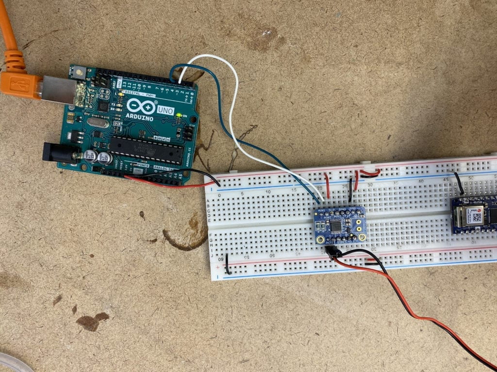 Arduino Uno wired into a breadboard and h bridge