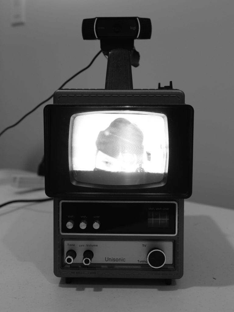 Tube television with rear projection