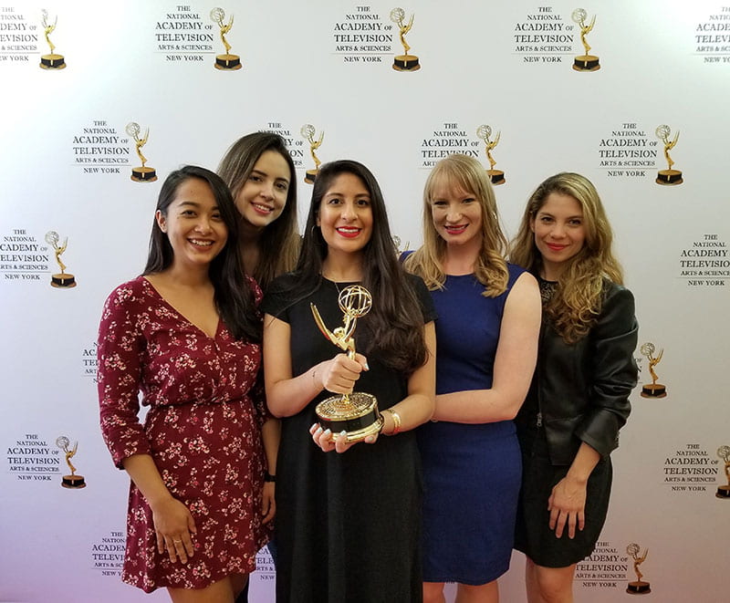 Photo of Winners with the Emmy award