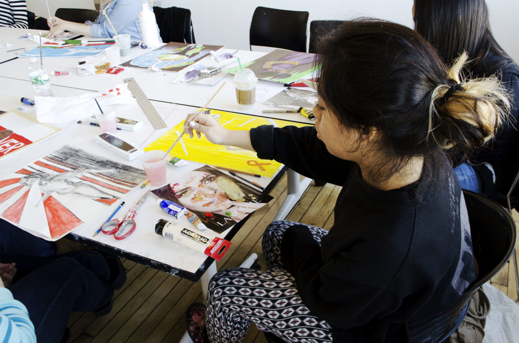 Student painting in the studio. 