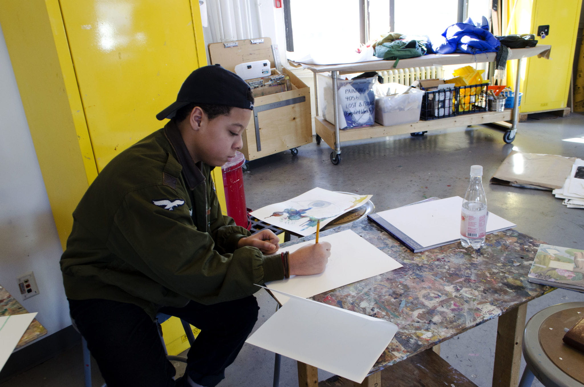 Student drawing in the studio.