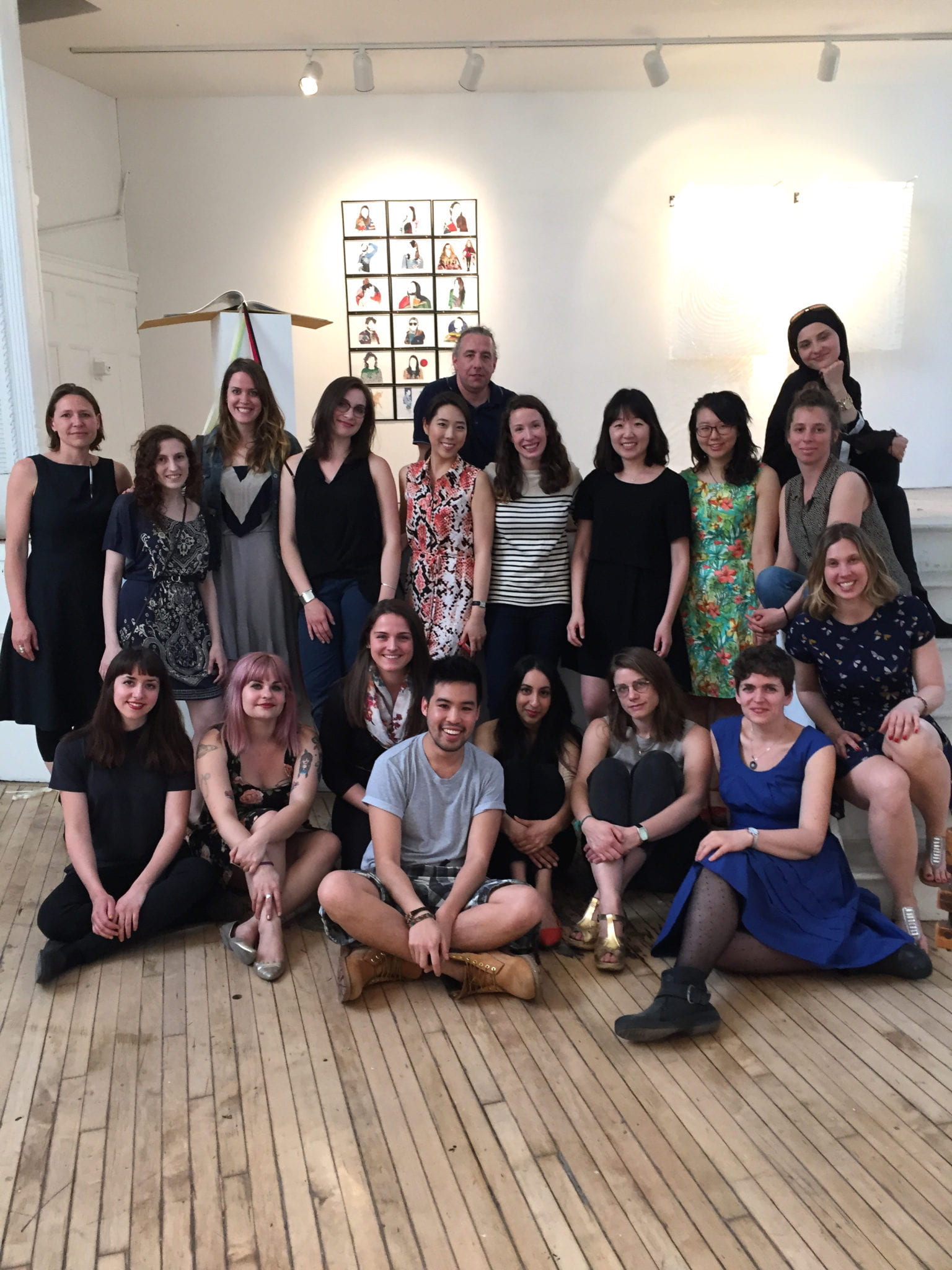 Group photo of graduate students at the Interrobang exhibition.