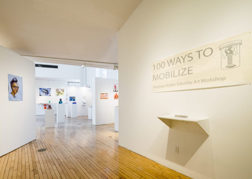 Entrance to Visionary Studio exhibition 100 Ways to Mobilize