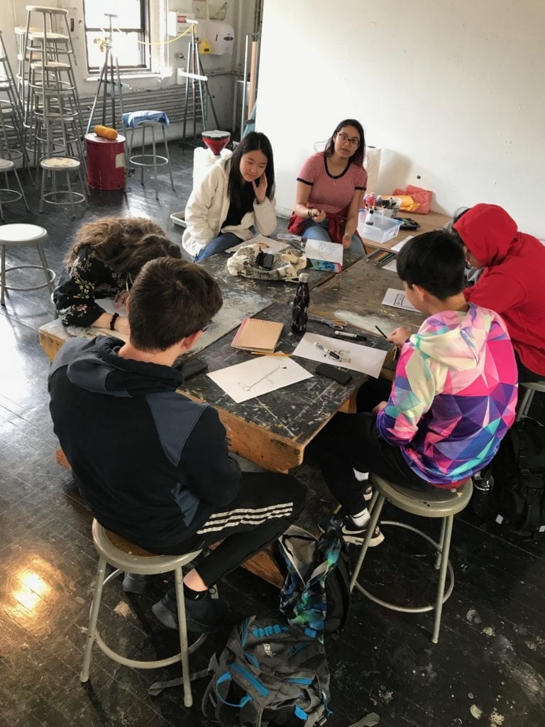 Students working in the studio together. 