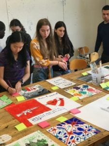 Students and their artwork during a Stop! Don't Shoot Visionary Studio session.