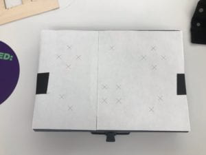 A picture of the box with the layout of holes