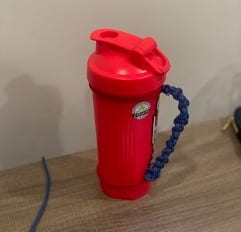 detachable handle on a large cup made from braided paracord. 