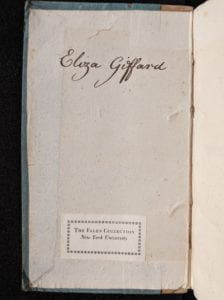 Inside cover of book with owner inscription in brown ink