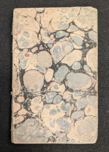 Front cover of book showing marbled papers