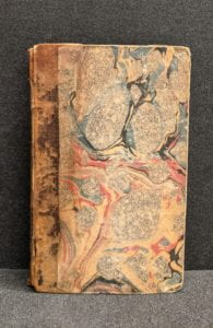 Cover of book showing marbled paper covers