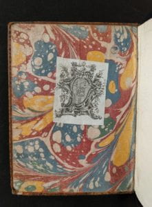 Inside cover of book showing armorial bookplate.