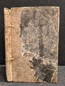 Front cover of book showing marbled paper cover.