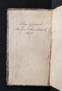 Inside cover of book showing ownership inscription.