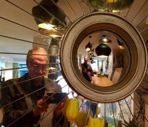 Professor Spear takes a selfie in a convex mirror