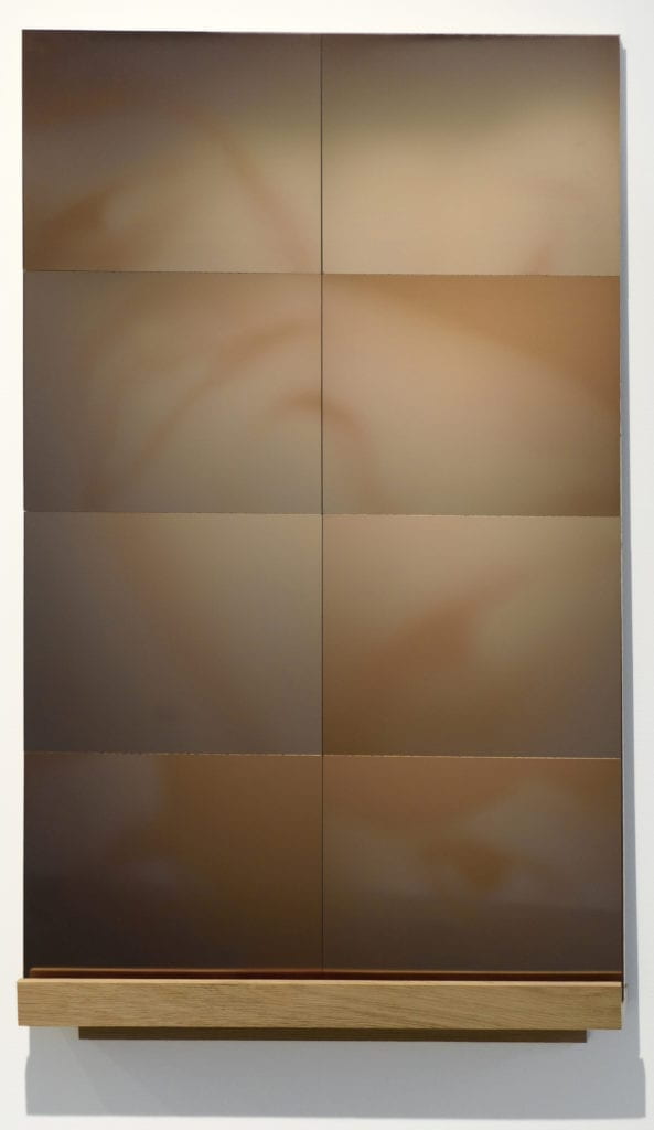 A bronzed tinted rectangular mirror.