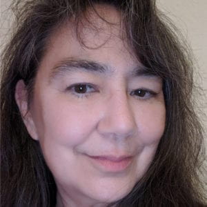 Headshot of a woman with brown hair