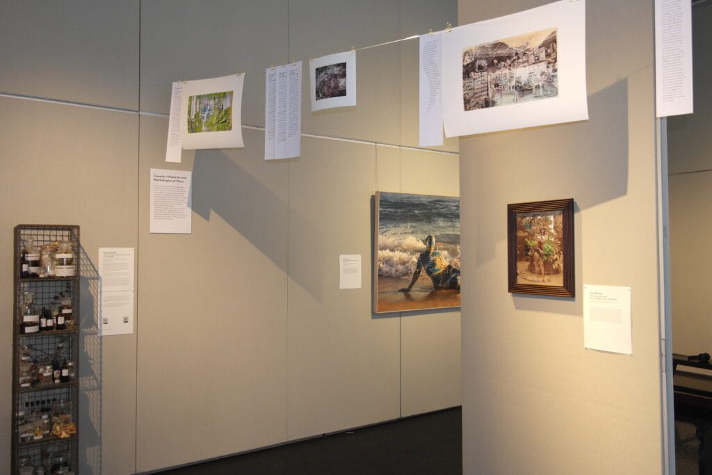 Gallery view with works by Tessa Grundon (Library of Lost Places and Tinctures of Lost Places), Joiri Minaya (Continuum and Container), and Himali Singh Soin and Alexis Rider (Brow of a God/Jaw of a Devil).