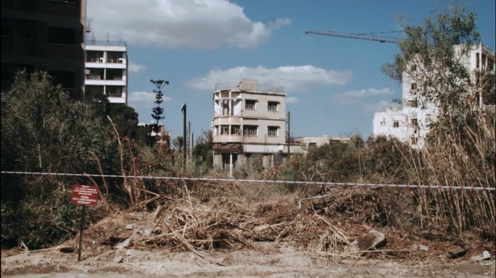 A photo of empty buildings in a desolate section of Cyprus, where the residents were forced to leave due to the conflict.