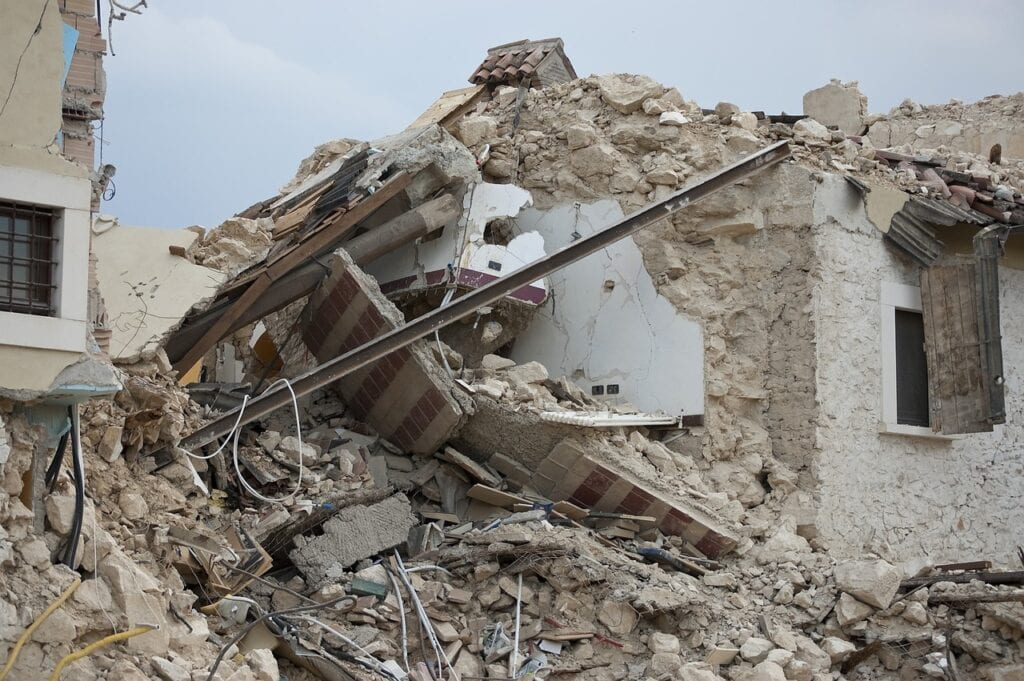 Building collapse and resulting debris in the wake of an earthquake