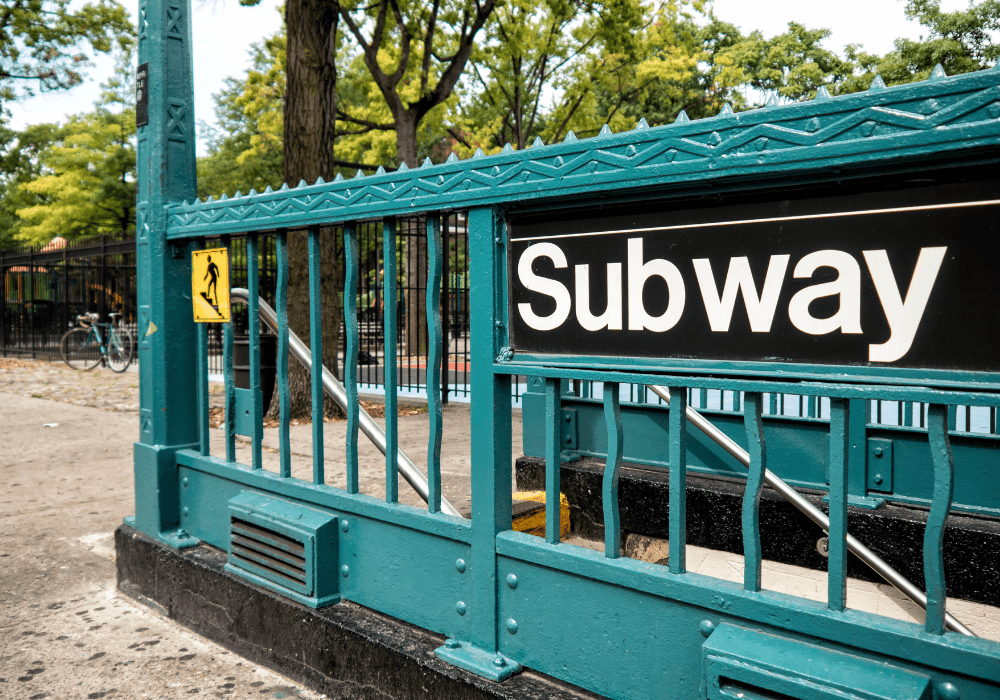 Image of a subway entrance in NYC.