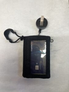 wallet on a alligator clip retractable cord with a zipper gripper