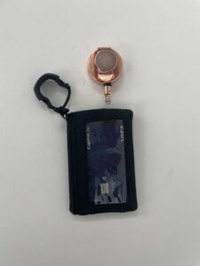 wallet on a magnetic retractable cord with a zipper gripper