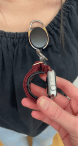 apple watch on a retractable cord with a stint piece inside 