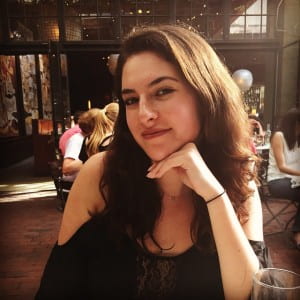 Author in cafe with sunlight shining on face