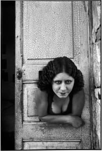 Woman in front of door