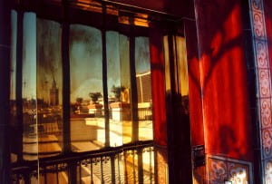 Balcony with light shining through stained glass