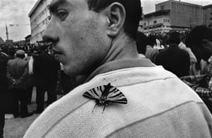 Man with butterfly on his shoulder