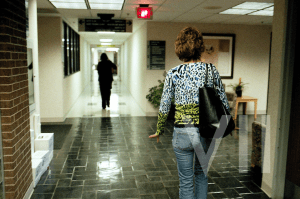 Woman leaving an expensive appointment.