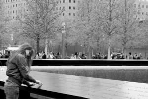 woman reading plaque