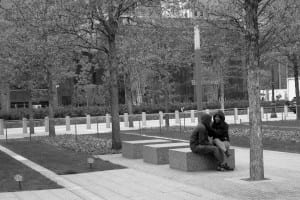 two people sitting in park