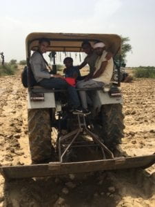 the author on a tractor