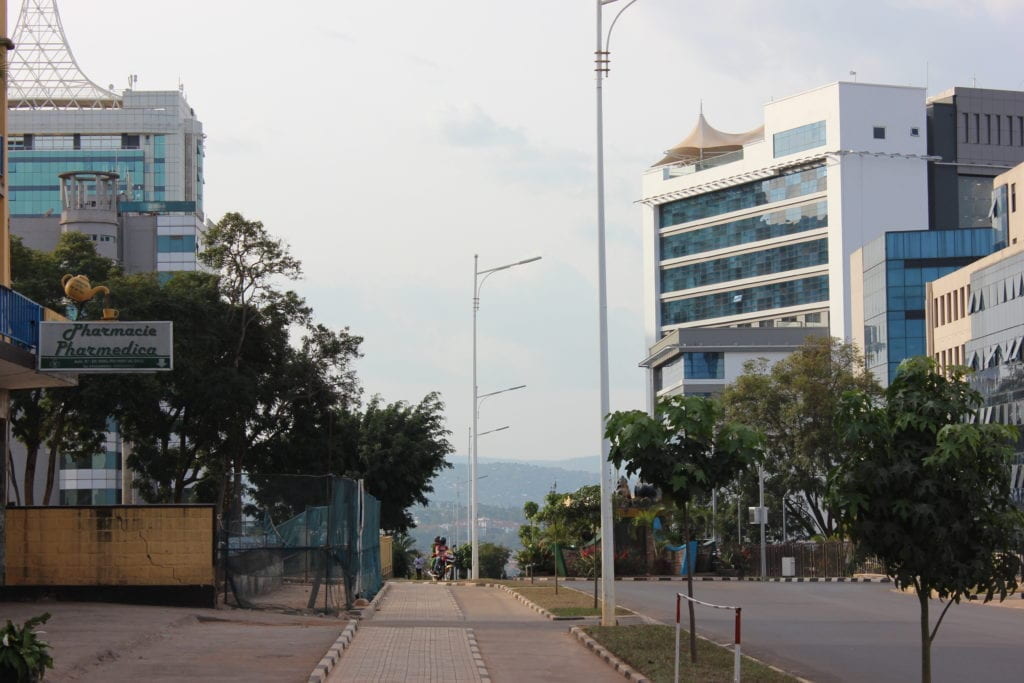 tall buildings surround the roads in the city center 